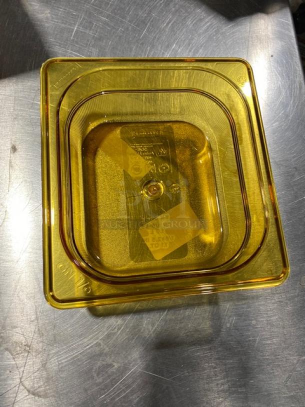 Rubbermaid Commercial Amber High Heat Food Pan, 1/6 size, Model FG204P00AMBR, new condition, clear markings visible.