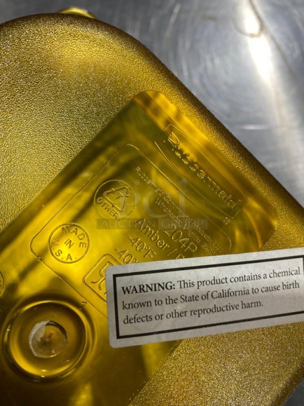 Rubbermaid Commercial Amber High Heat 1/6 Size Food Pan, Model FG204P00AMBR. Made in USA. Warning label visible.