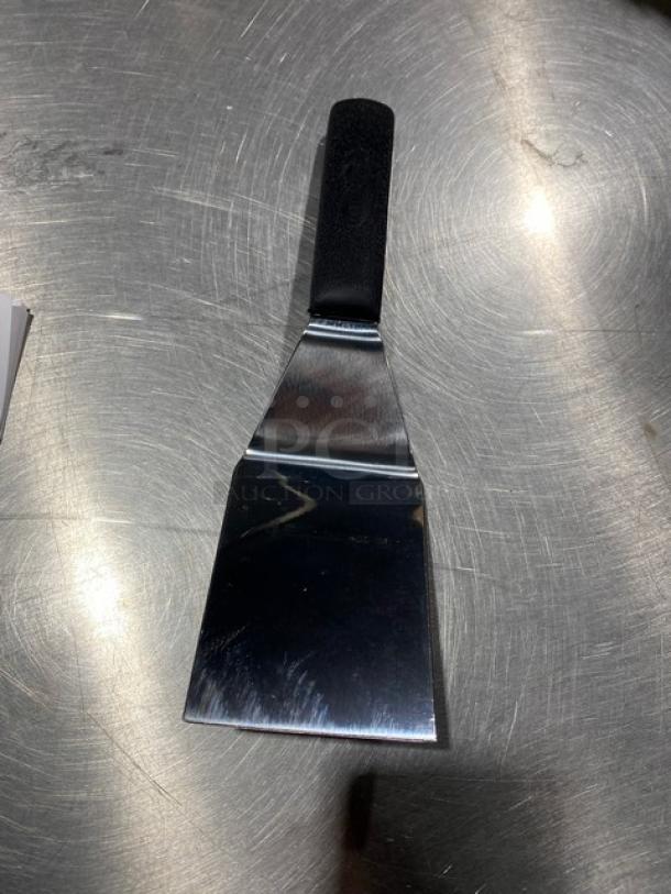 Dexter Russell Sani-Safe hamburger turner, stainless steel, 4"x3", black grip, model S286-4, new condition.