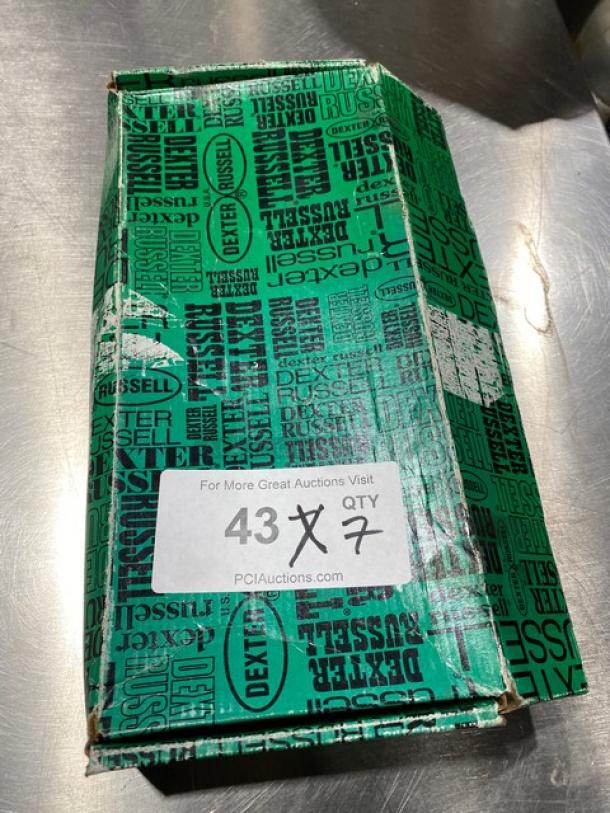 New Dexter Russell Sani-Safe 6'' deboning knife, model EP136ST, with orange grip handle in original packaging.