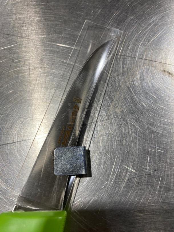 Dexter Russell Sani-Safe Series 5" stainless steel boning knife, model S131-5, with lime-green grip handle.