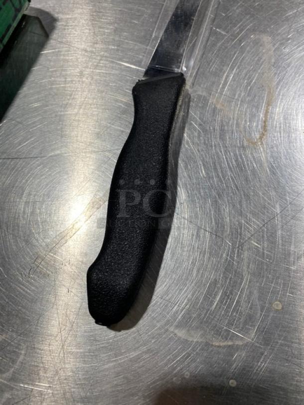 Dexter Russell Prodex boning knife, model PDSH1316ST, with black grip handle. Stainless steel blade, new condition.