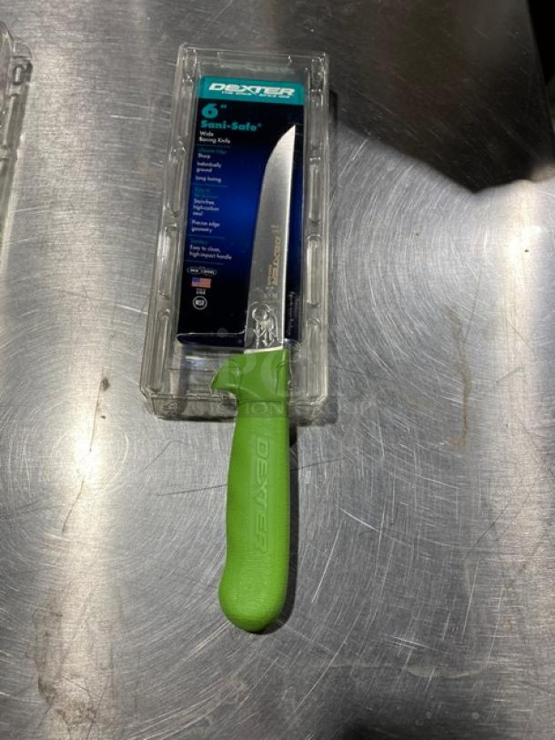 Dexter Russell Sani-Safe 6" boning knife, model S136, with stainless steel blade and green grip handle, in packaging.