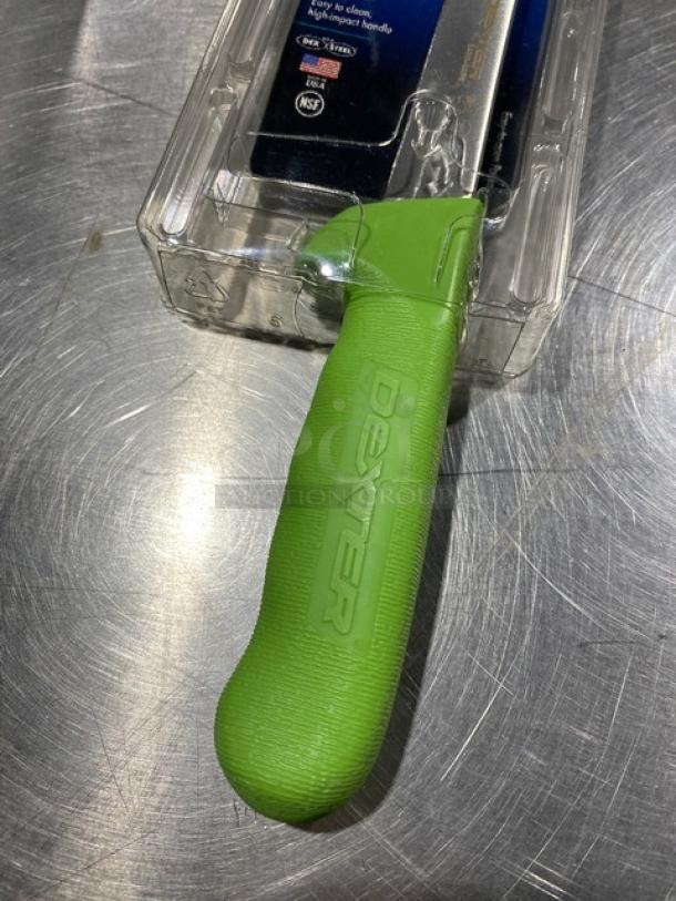 Dexter Russell Sani-Safe 6" boning knife, model S136, with green grip handle, stainless steel blade, in original packaging.