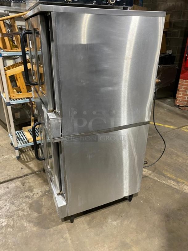 Southbend GS25SC double-stacked stainless steel convection oven, natural gas-powered, wired rack, on legs.
