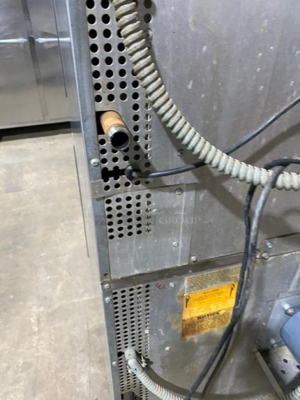 Southbend commercial stainless steel convection oven, model GS-25SC, natural gas-powered, with wiring and tags visible.