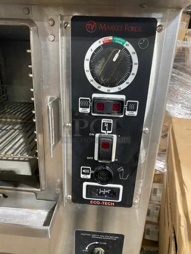 Market Forge Eco-Tech ET-3E stainless steel pressure steamer, 208V, 3 phase, with controls visible. Commercial-grade, single compartment.