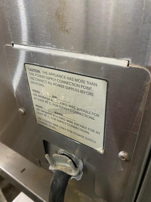 Market Forge Eco-Tech ET3E pressure steamer, stainless steel, electric, 208V 3 phase, on legs, with caution label plate.