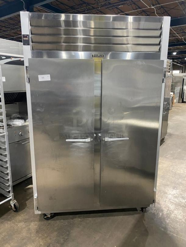 Traulsen G22010 commercial stainless steel 2-door refrigerator, electric, on casters, with poly coated wire racks. Model SN: T71427G14.