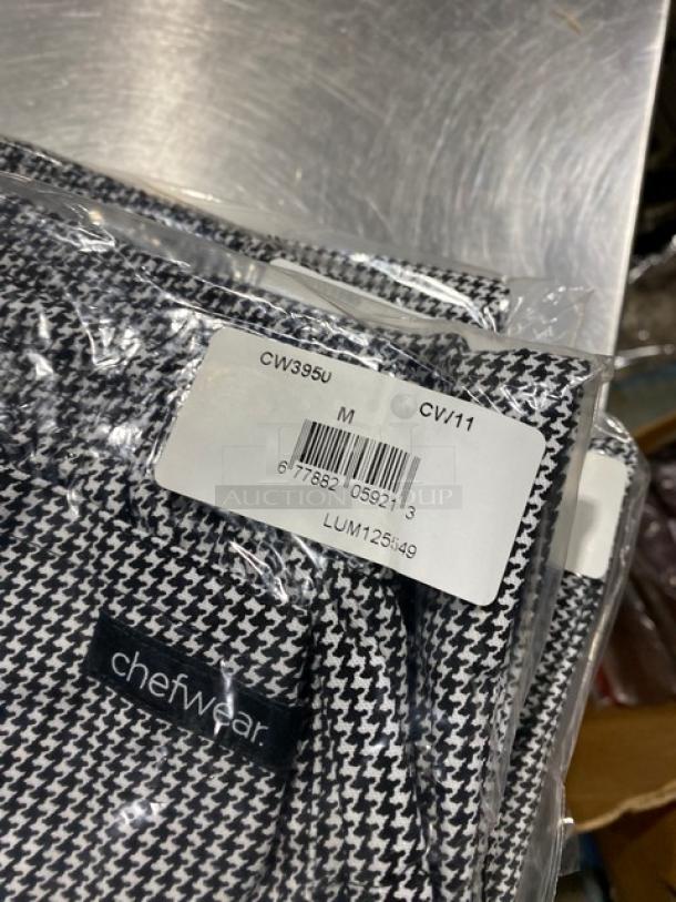 NEW Chefwear CW3950 medium-size chef pants, black & white. New condition, original packaging with label details visible.