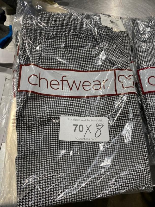Chefwear CW3950 medium chef pants, black and white checkered, new in packaging with branding and auction label visible.