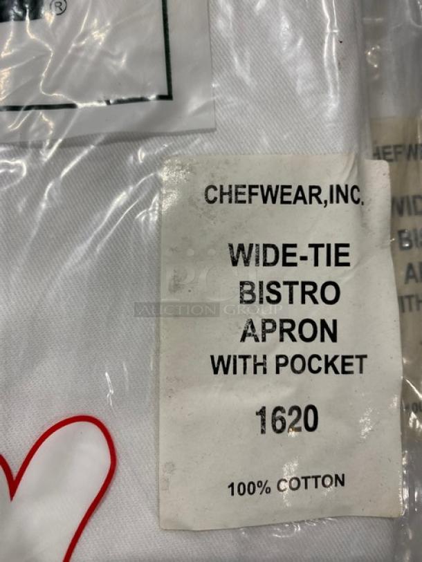 Chefwear white cotton wide-tie bistro apron, model 162040, with pocket. New condition, features original packaging and label.