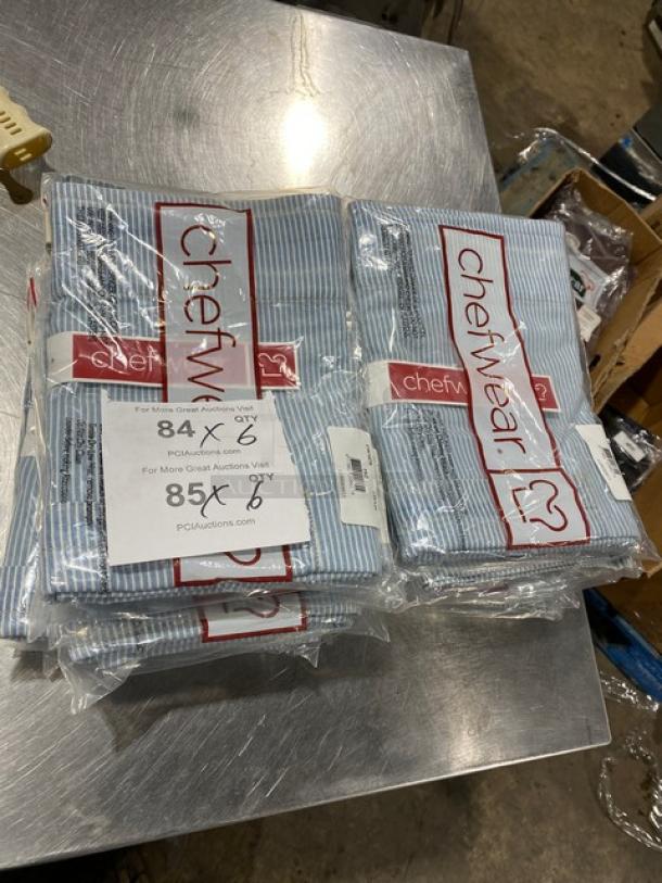 Chefwear waist aprons, model CW1679-CW134, in white and light blue stripes. New with pocket, one-size, in packaging.