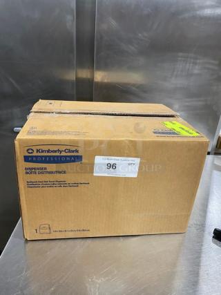 Kimberly Clark Sanitouch Paper Towel Dispenser, Model 09996, new in box. Smoke black color, commercial-grade quality.