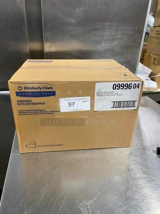 Kimberly Clark Professional 09996 Sanitouch Paper Towel Dispenser in unopened box, featuring smoke black color.