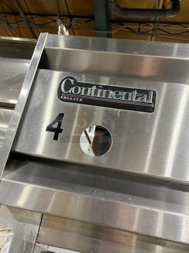 Continental Commercial Stainless Steel 2-Door Reach-In Freezer, Model 2F, features solid doors, pan slides, poly-coated wire racks.