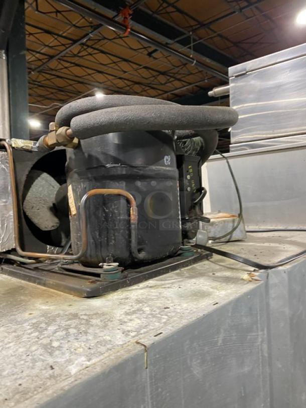 Continental 2F solid 2-door reach-in freezer, stainless steel, 115V, with pan slides, poly-coated wire racks, on casters.