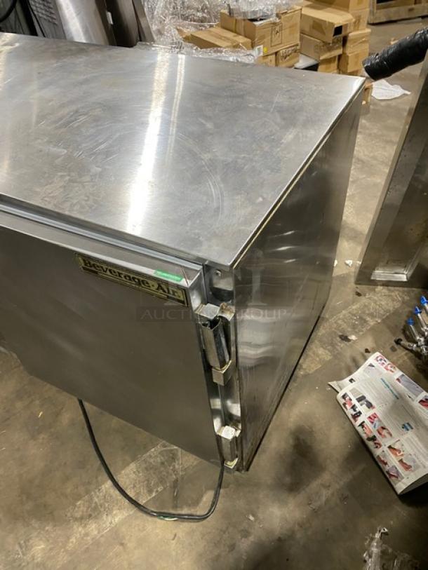Beverage-Air commercial stainless steel 2-door undercounter worktop refrigerator with poly-coated wire rack, on casters.