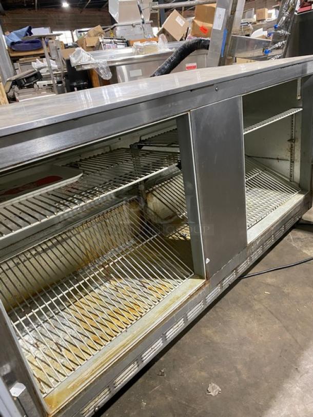 Beverage-Air stainless steel 2-door undercounter refrigerator, poly-coated wire racks, 115V 1 phase, on casters, used condition.