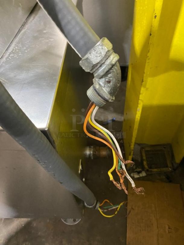 Market Forge Eco-Tech Plus ETP-10E commercial steamer wires exposed; 480V, 3 Phase, stainless steel, on legs. Energy Star certified.