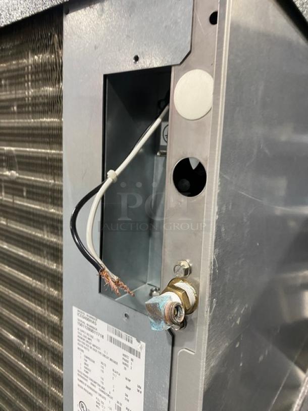 Ice-O-Matic ICE0400HA5 stainless steel ice machine close-up, shows wiring and Energy Star label. Model: ICE0400HA5, SN: 15011280011718.