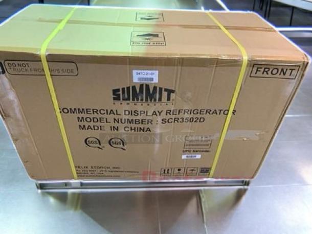 Brand new Summit SCR3502D commercial double-door display refrigerator in original box. Model and origin details visible.