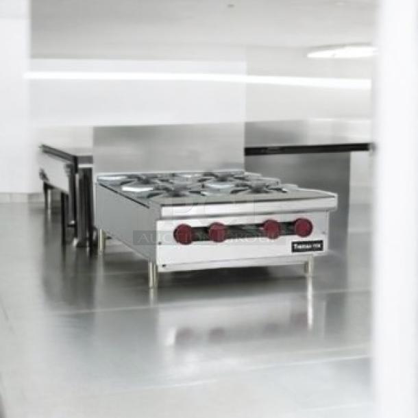 Tansan commercial 4-burner gas range in outstanding condition, heavy-duty stainless steel, fully tested and working.