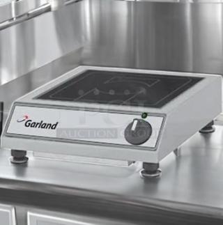 Garland countertop induction cooker, single burner, superb condition, 120V. Features power dial and indicator light, fully tested.
