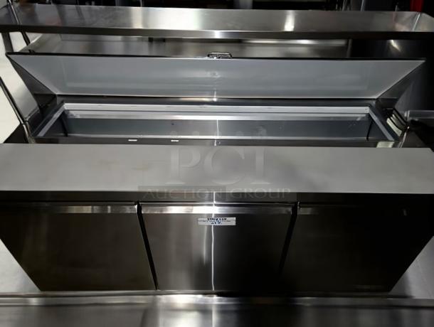 Turbo Air MST-72-X 72" refrigerated prep table in outstanding condition. Stainless steel, fully tested, 120V, with spacious interior.