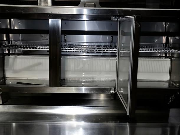 Turbo Air MST-72-X 72" refrigerated sandwich/salad prep table, stainless steel, open door view, excellent condition.