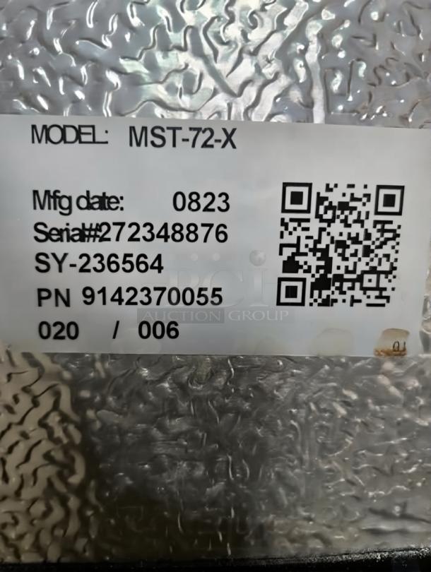 Turbo Air MST-72-X refrigerated prep table label; model, manufacturing date 0823, serial #272348876, QR code.