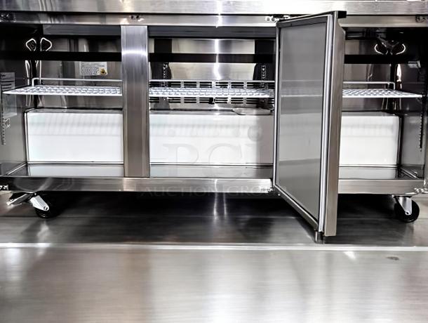 Turbo Air MUR-72X undercounter refrigerator, 72", stainless steel, open door showing interior shelves, superb condition.