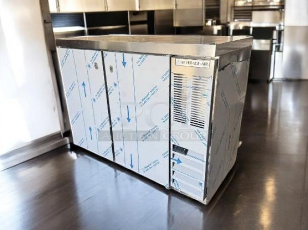 Pristine Beverage-Air underbar refrigerator, 3-door stainless steel, brand new, 120V, fully operational, protective film.