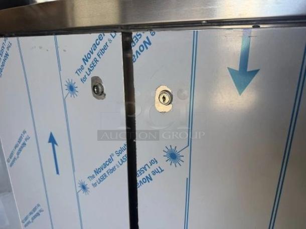 Beverage-Air 3-door stainless steel underbar refrigerator in pristine condition with protective film and visible locks; 120V, brand new.