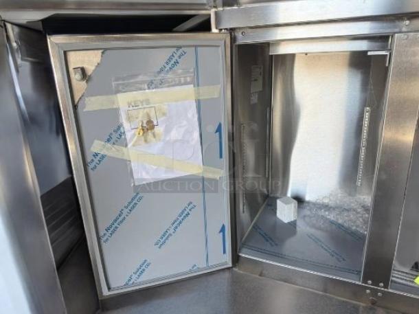 Beverage-Air 3-door underbar refrigerator, stainless steel, pristine condition, keys visible, brand new and fully operational.