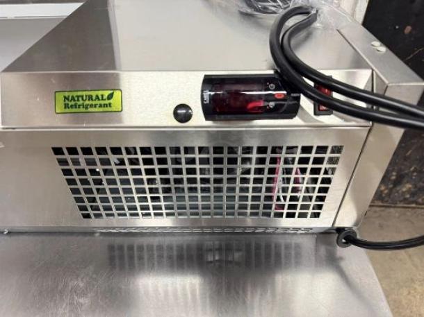 Turbo Air CTST Series countertop salad/prep table, brand new, 120V. Features stainless steel, natural refrigerant label.