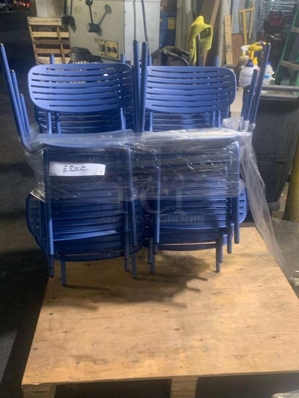 Set of blue metal stackable café chairs, pristine condition, wrapped and ready for use.