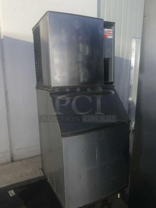 Manitowoc SY0654A Ice Machine and Bin, fully tested, in prime condition, visible labels indicating model and specs.