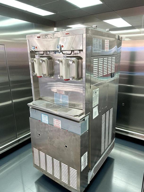 Taylor 0772 soft serve ice cream machine, stainless steel, dual dispensers, model markings visible, tested working condition.
