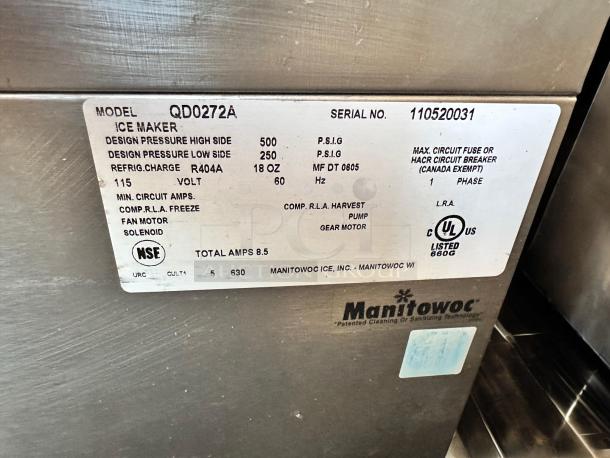 Manitowoc QD0272A Ice Maker in excellent condition, 115V, air-cooled. Label details specs: design pressure, refrigerant type.