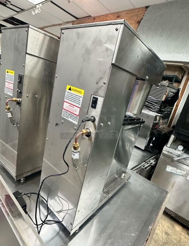 Brand new Newco CLDBR-3.5G cold brew coffee dispenser, 3.5 gallon, 120V, NSF certified, fully tested. Stainless steel, with visible warning label and power cord.