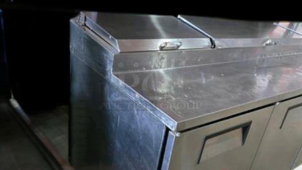 True TPP-93 3-door mega-top pizza prep table refrigerator in excellent condition, stainless steel, tested and working.