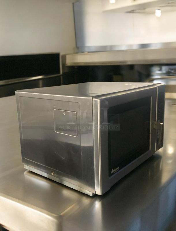 Amana RFS12MPSA commercial microwave oven, 1200W, excellent condition, tested and working, stainless steel exterior.