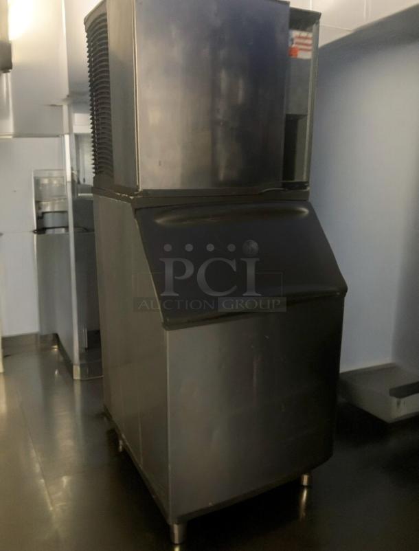 Manitowoc SY0854A Ice Maker with storage bin, outstanding condition, fully tested, 115V, durable stainless steel.