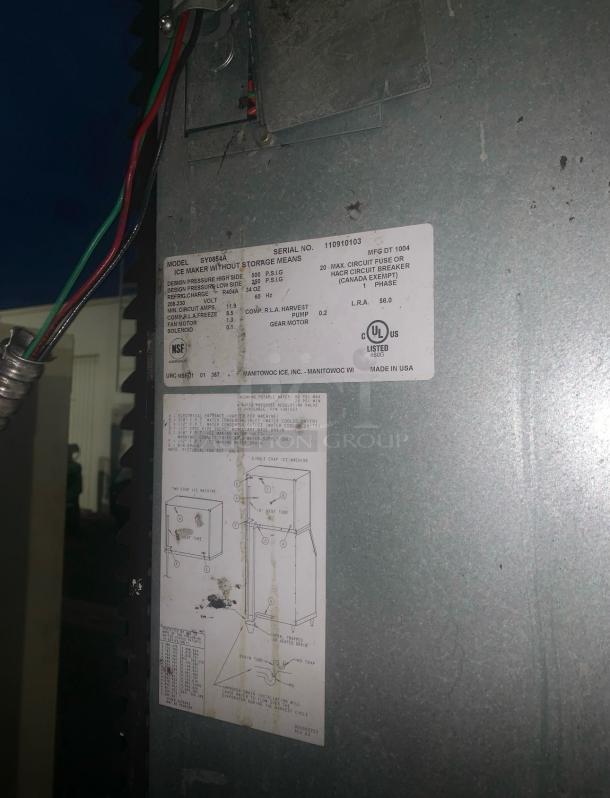 Manitowoc SY0854A Ice Maker with storage bin, outstanding condition, 115V, manufactured in USA, serial number 110910103.