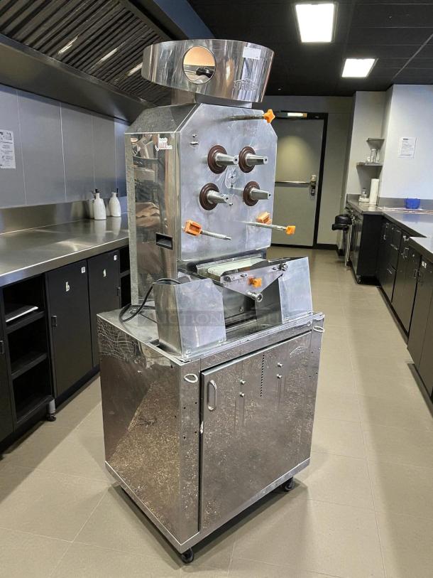 Citrocasa 8000 SB-ATS Advance Citrus Juicer with base, stainless steel finish, used condition, sold as-is.