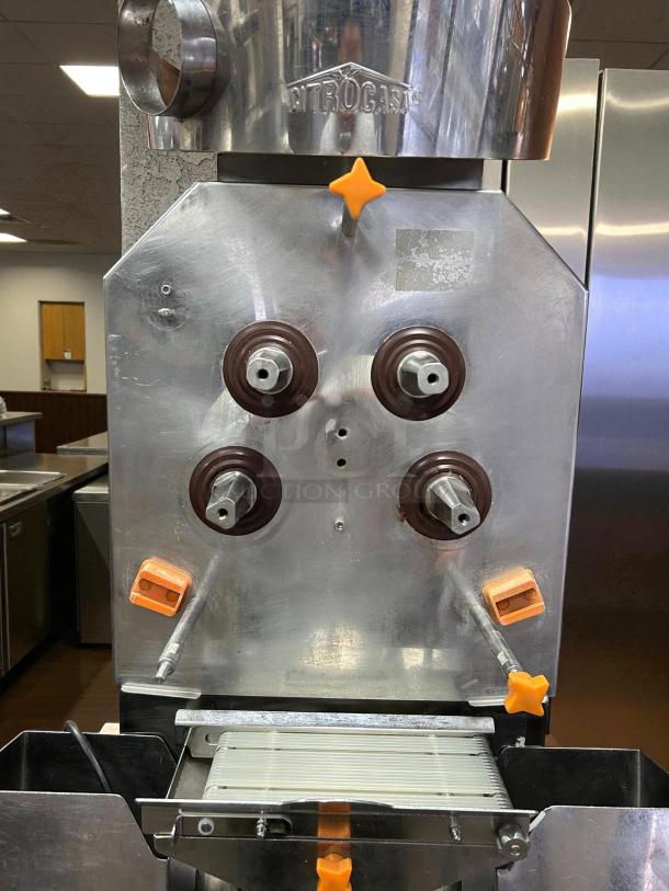 Citrocasa 8000 SB-ATS citrus juicer with base, stainless steel, visible wear, sold as is, branded "CITROCASA" on top.