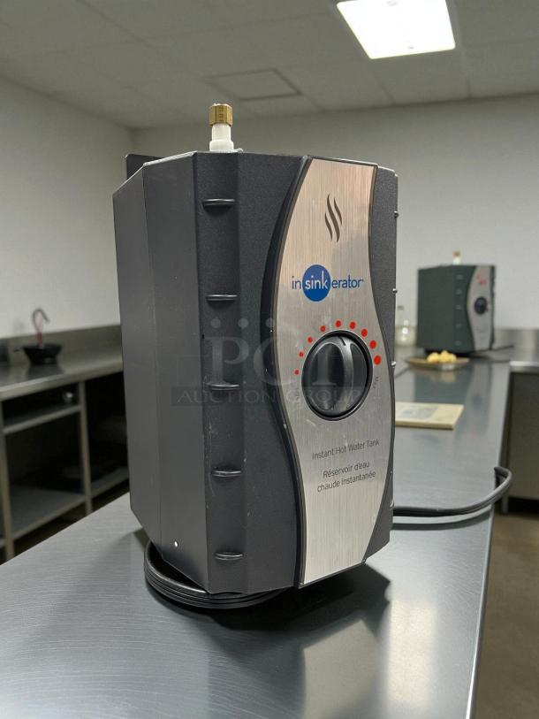 InSinkErator C1300 Instant Hot Water Dispenser, 115V, tested and working, stainless steel finish, logo and control dial visible.