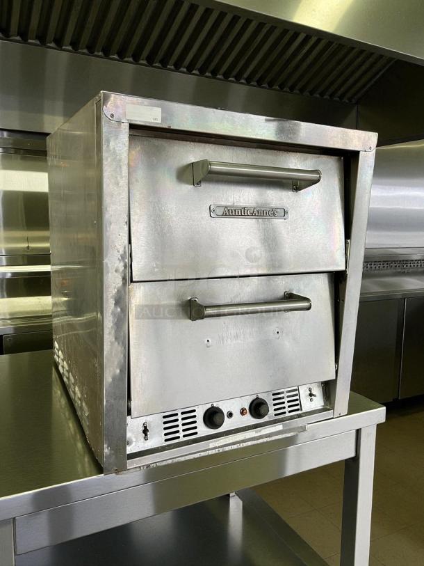 Bakers Pride P-44S electric countertop pizza oven in excellent condition, 220-240V, 3-phase, 7200W, tested working, features dual doors.