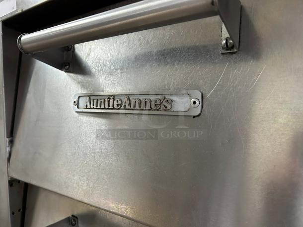 Bakers Pride P-44S electric pizza and pretzel oven, stainless steel, Auntie Anne's logo, excellent condition, tested, 220-240V, 3 phase, 7200W.